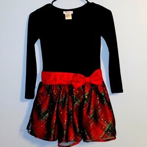 Dress with black top and red,green and black skirt